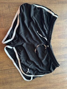 Puma Black Athletic Shorts with Red Brand Tags